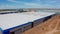 Construction of new large storage under blue sky aerial view