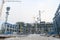 Construction of a new oil refinery, petrochemical plant with the help of large building cranes