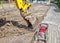 Construction of a new road. excavator prepares the surface