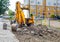 Construction of a new road. excavator prepares the surface