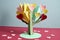 Construction paper craft tree with hearts for Valentines Day