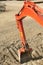 Construction red excavator dozer bucket detail