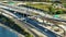 Construction roadworks on American transport infrastructure. Renovation of highway interchange with traffic in Miami