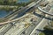 Construction roadworks on american transport infrastructure. Renovation of highway road interchange with moving traffic