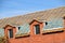 Construction of the roof of a new house. Wooden bars and vapor barrier