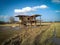 Construction of a rural house of straw in autumn