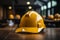 Construction safety Yellow helmet positioned on a table for workers