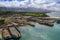 Construction of a sea port with reclaimed soil in Albuera, Leyte. Multiple barges parked in area