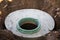 Construction of a septic tank. Large concrete rings embedded in the ground, from above an open sewer hatch, unprotected by a cover