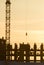 Construction side - silhouette at sunset - in front of the sun