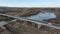 Construction site of a bridge across the road . Bird eye. big faucet. Aerial view of the construction of the bridge