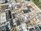 Construction site with cranes. Construction workers are building. Aerial view of construction site of residential area buildings