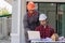 Construction site engineers, two businessmen Engineering objects in workplace