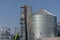 Construction site. Installation of cylindrical silos for grain s