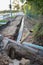 Construction site for installing fiber optic cables under the ground for fast internet in a street of a german village, selected