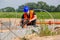 Construction or site manager checking or overseeing the foundations of the new house, buidling or construction