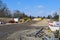 Construction site with various materials in front of some earthmovers in Berlin-Lichtenrade