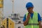 A construction site worker talking on a walkie-talkie stock image