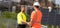 construction supervisor handshaking deal. construction supervisor handshaking deal at site.