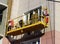 Construction suspended yellow cradle without workers on a newly built high-rise building