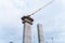 Construction of tall concrete pylon of bridge using tower