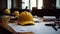 Construction team planning, Yellow safety helmet on the office desk with contract