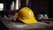 Construction team planning, Yellow safety helmet on the office desk with contract