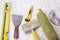 Construction tools: level, roller, trowel, glasses, knife and brush