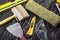 Construction tools: level, roller, trowel, glasses, knife and brush