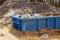 Construction trash dumpsters in an metal container, home house renovation