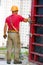 Construction worker assembling cement formwork