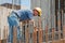 Construction worker busy with forwork frames