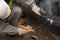 A construction worker doing a weld