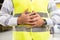 Construction worker or engineer pressing painful stomach