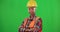 Construction worker, green screen portrait or black woman builder with smile or copy space in building industry