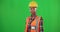 Construction worker, green screen portrait or happy black woman with smile in building industry. Contractor, studio