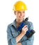 Construction Worker Holding Cordless Drill While Looking Away