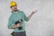 The construction worker holds an electric screwdriver in his hand, various situations