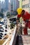 Construction Worker Installs Rebar - Vertical