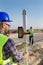 Construction worker with laser receiver