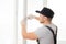 Construction worker man install plastic white upvc windows in house