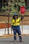 Construction worker managing traffic with stop sign, Sydney Australia.