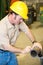 Construction Worker Marking Pipe