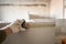 The construction worker measures with a tape measure Gypsum plate. Construction of internal walls in the apartment using