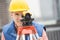 Construction Worker Measuring Distances With Theodolite