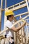 Construction Worker Measuring Timber