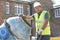 Construction Worker Mixing Cement