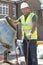 Construction Worker Mixing Cement