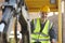 Construction Worker Operating Digger On Site