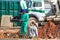 Construction worker performs the construction of the factory shed